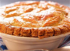 Pintando con un pincel empapado en huevo batido, dará brillo y un bonito dorado a las empanadas